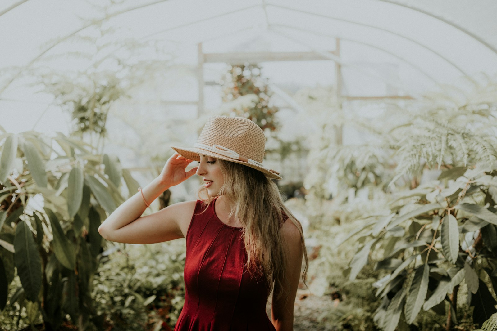 Photo by Priscilla Du Preez 🇨🇦 women's red sleeveless dress